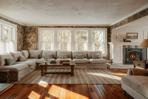 Cozy living room with sofa and fireplace