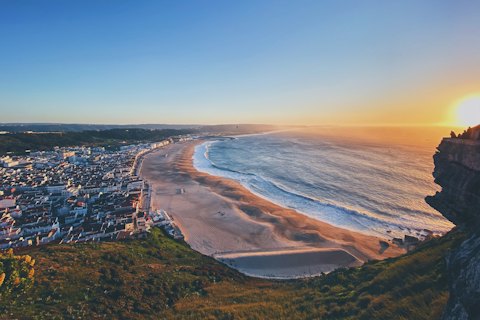 Nazaré and its long beach in evening light