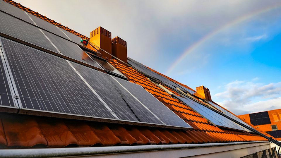Solar panels on a terracotta-tiled roof